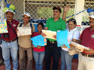 Farmers at the opening of a new school built by SchoolBox in Nicaragua.