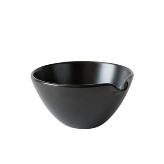 Black matcha pouring bowl with a spout.