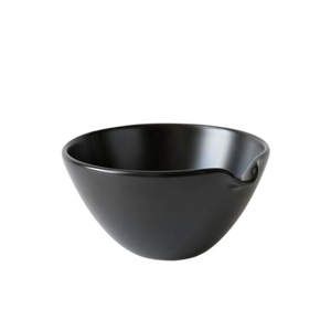 Black matcha pouring bowl with a spout.