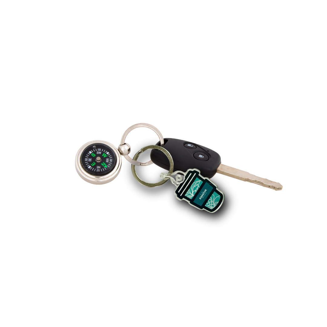 Keychain with a car key, takeout cup design and a compass keychain.