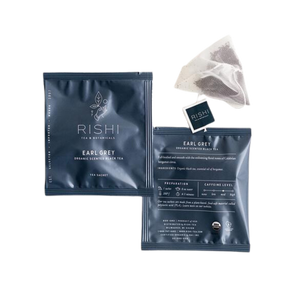 Two packages and a bag of Rishi earl grey tea